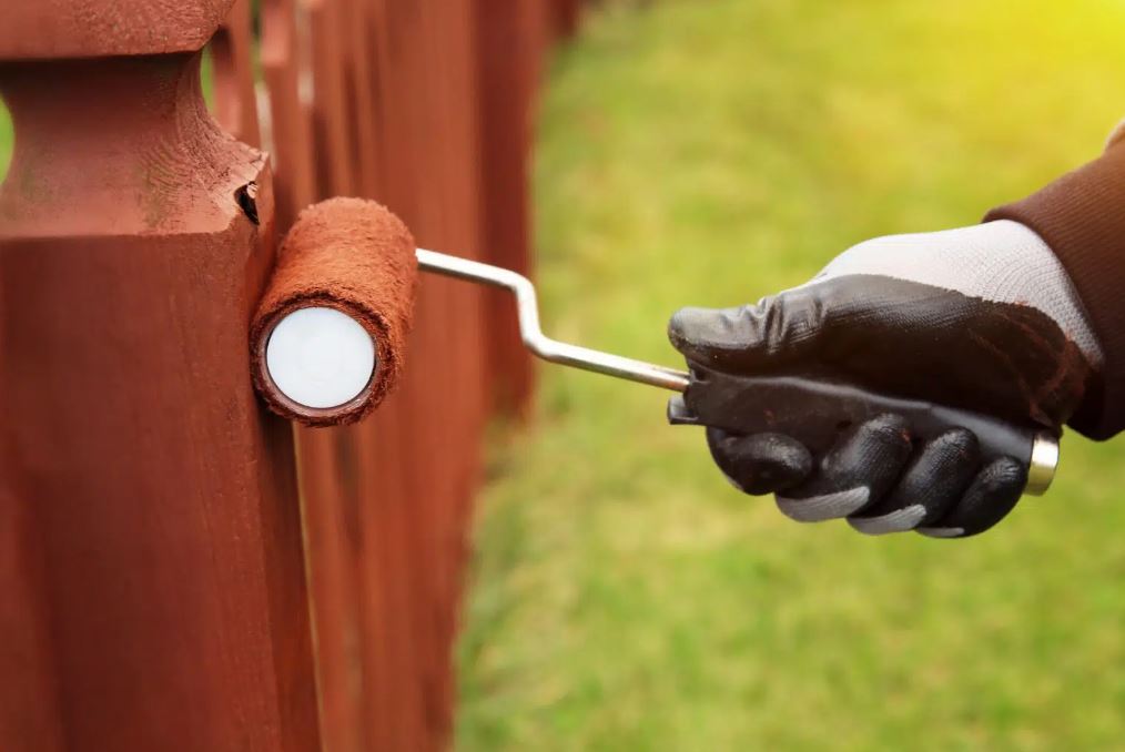 fence painting with roller in sydney